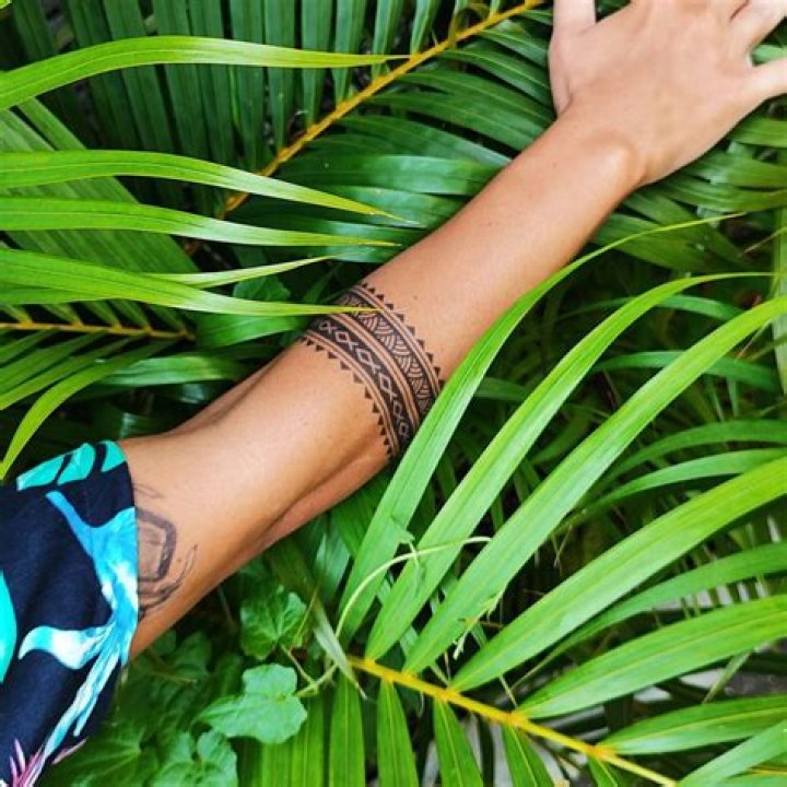 Uncover The Enchanting Realm Of Polynesian Arm Band Tattoos
